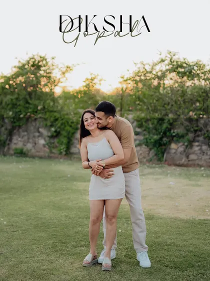 A happy and candid embrace in a park, personalized with the couple's names for a special touch.