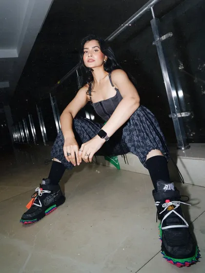 A full-length shot showcasing my streetwear style, a key element of my identity as a DJ and influencer.