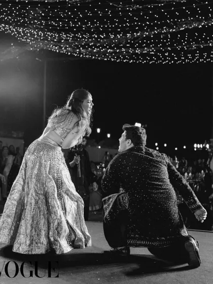 A classic Bollywood pose for a timeless love story. This black and white shot from Kasturi and Vineet's Vogue-featured wedding captures the romance of their couple performance. We make sure every moment on stage is picture perfect.