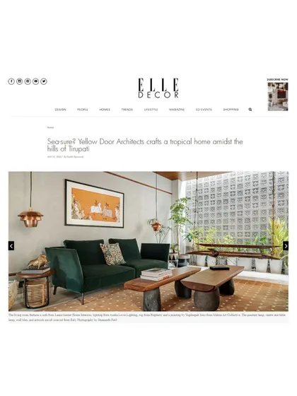 A screenshot of the online feature in Elle Decor for the Kamala Residence, titled "Seas-eye: Yellow Door Architects crafts a tropical home amid the hills of Tirupati."