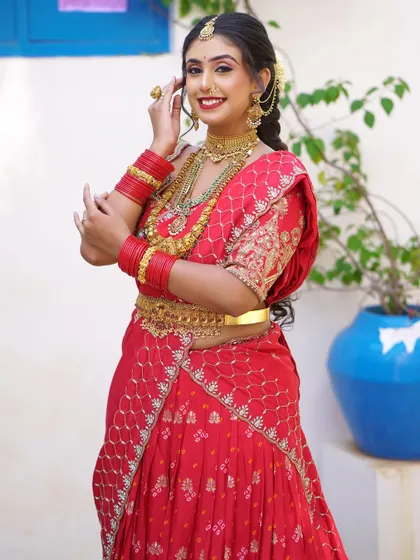 A joyful, candid-style shot of the bride. The makeup remains flawless even in motion, perfect for a day full of celebration and dancing.