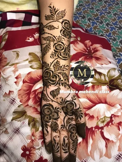 A full-arm floral vine design, perfect for any celebration.
