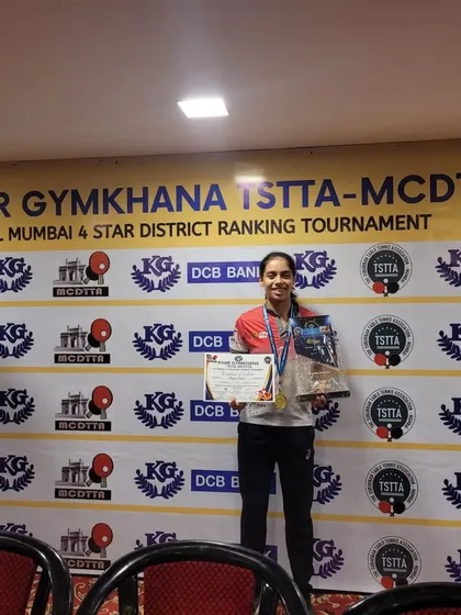 Ananya Chande on the podium after winning the U-19 girls' title at the Khar Gymkhana tournament. She also reached the quarterfinals in the Women's category, a great performance overall.