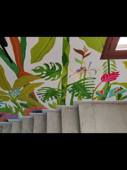 Looking down from the top of the stairs, you can see how the tropical patterns create a beautiful, continuous piece of art.