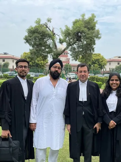 A landmark moment in my career, standing with my client and senior counsel outside the Supreme Court. We successfully defended the constitutionality of the Haryana Sikh Gurudwara (Management) Act, 2014, a case of immense significance.