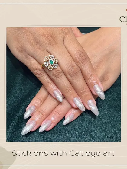 A game-changing look. These gel-based stick-on nails feature a stunning silver cat eye art, offering a great alternative to extensions with a flawless finish.