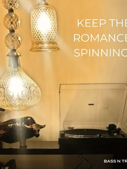 Keep the romance spinning. A turntable setup under warm lighting creates an unbeatable ambiance for a cozy evening with your favorite records.