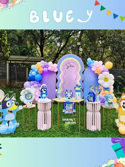 We brought the fun of the Heeler family to this second birthday with a Bluey theme. The outdoor setup featured Bluey and Bingo cutouts, daisy balloons, and a pastel rainbow color scheme for a playful and happy celebration.