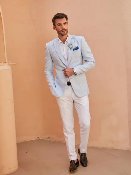 Another angle of the Arctic Blue linen suit, proving its impeccable tailoring from every view. This is the kind of sartorial summer suit that gets you noticed for all the right reasons.