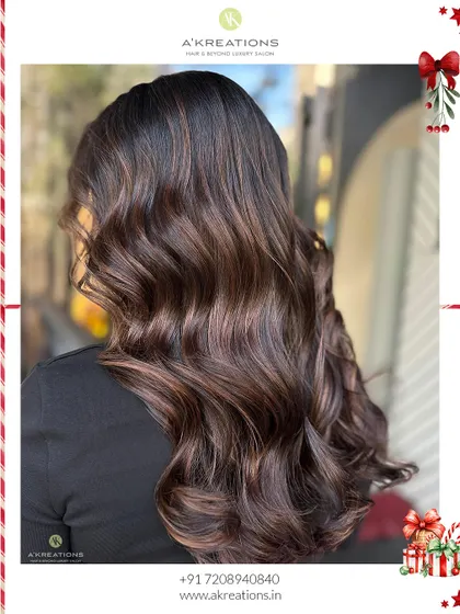 A side view of our deep chocolate brown color, showcasing the soft waves and incredible shine that make this style so popular.