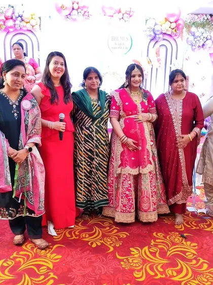 Group photo with the ladies of the family. I always make time to connect with guests and make sure everyone feels part of the celebration.