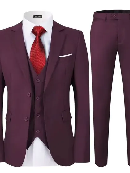 A complete three-piece suit set in a deep wine or maroon color. This is a very popular color for weddings and festive seasons.