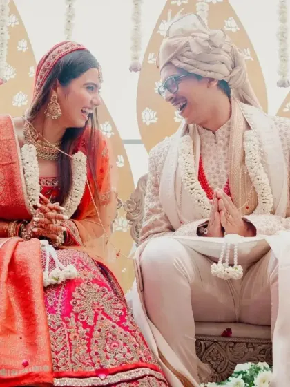 A candid shot of the bride and groom sharing a laugh during their wedding ceremony, capturing their easy chemistry.