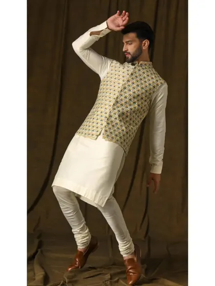 A dynamic pose in the lemon and ivory Bandi set. This shot highlights the modern energy of the ensemble, proving that traditional wear can be playful and full of life.