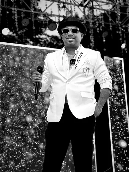 A black and white portrait in my white blazer. This look is sharp, modern, and perfect for commanding a grand stage.