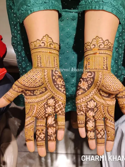 A beautiful design with a mix of floral and geometric patterns. The wrist cuff adds a lovely finishing touch.