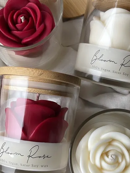 A close-up of the personalized label on the Bloom Rose jar candle.