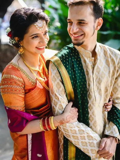A beautiful, happy portrait of the couple. Their smiles light up the frame, showing their easy and joyful connection.