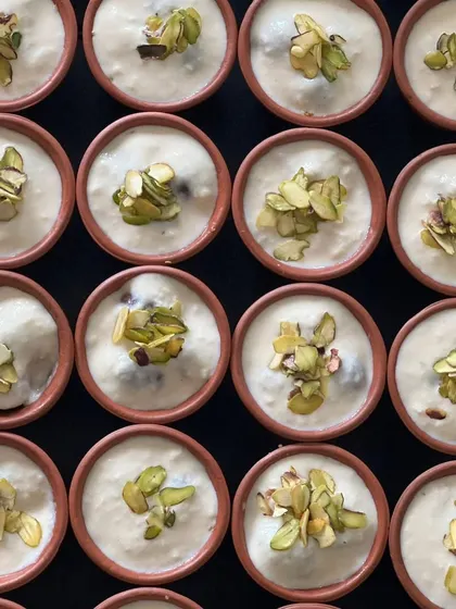 An overhead shot of our Phirni bowls, showing the consistent quality and beautiful garnish on each serving.