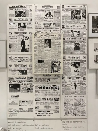 A collage of newspaper front pages from the time of Indira Gandhi's tenure. The museum uses these archival media clippings to document major political events and public discourse during her time as Prime Minister.