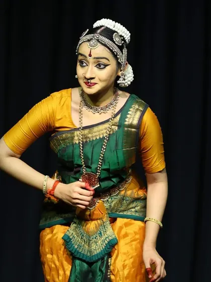 An expressive moment from the Ninada Nruthyotsava. The yellow and green costume adds a different visual flavor to my repertoire.