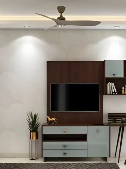 A multi-purpose unit that combines a TV console with a dedicated study desk. This is a great space-saving solution for a bedroom or living area, providing functionality for both work and leisure.