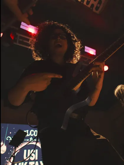 Rishi gets into the guitar part on stage, one of the playing moments we shared in our farewell tribute.