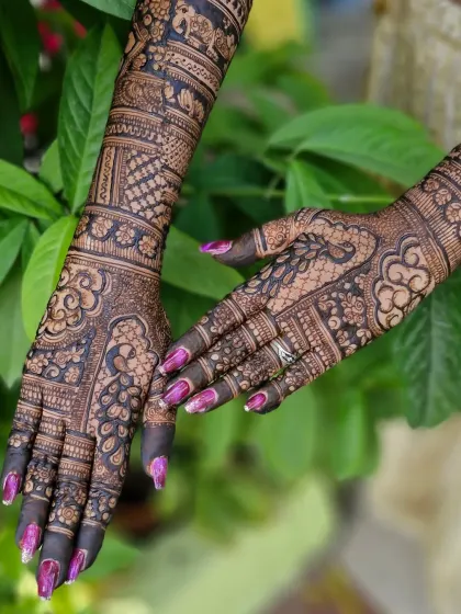 A beautiful example of intricate bridal mehendi with peacock and floral motifs, perfect for a bride who loves detailed and delicate patterns.