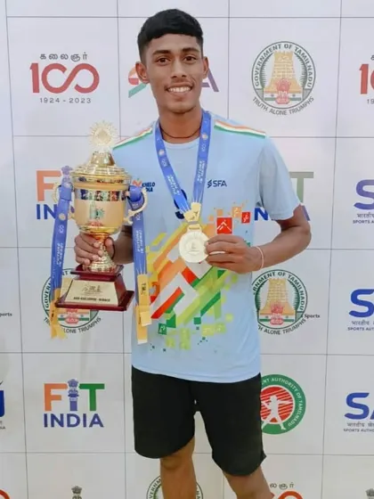 Our champion, Ramchandra Sitaram Zore, holding the gold medal and trophy after a spectacular win at the Khelo India Youth Games in Madurai. We train our athletes to excel on the national stage.