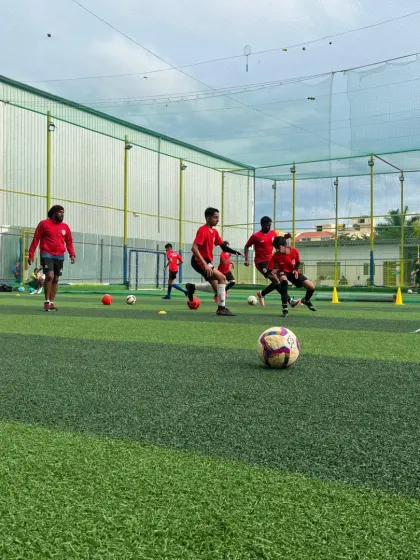 Players engaged in a dynamic passing drill, a core part of our program to build a strong foundation for a professional pathway.