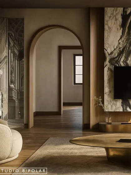 We love creating a journey through a home. This view shows how the arched doorway frames the next space, while a curved wall with mural wallpaper on the left adds an artistic layer, softening the room's edges.