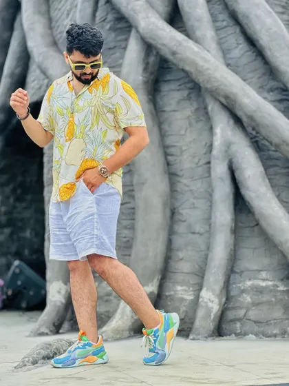 A full-length view showing how I pair a fun shirt with colorful sneakers for a complete look.
