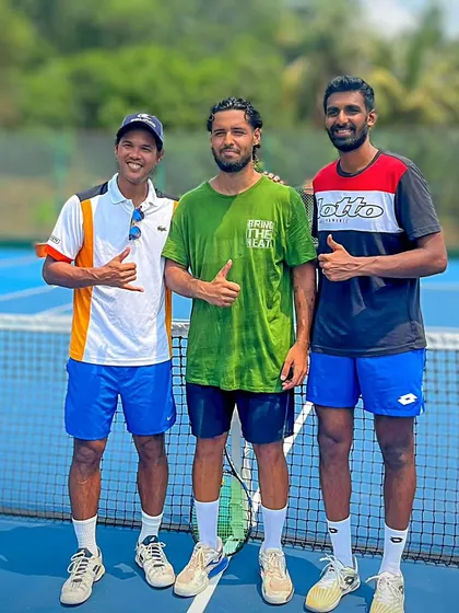Learning from the pros. Our players with tennis stars Sumit Nagal and Prajnesh Gunneswaran at the Goa training camp. Exposure to professional players is a key part of our mentorship program.