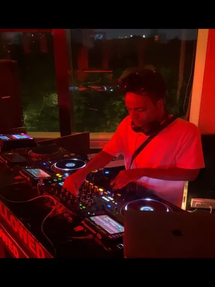 Using my laptop alongside the CDJs for a hybrid setup. This allows me to access a vast library of music to cater to any request or vibe.