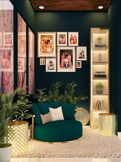 A cozy nook designed for quiet evenings. The deep green walls, plush armchair, and curated gallery wall create a rich and personal reading corner.