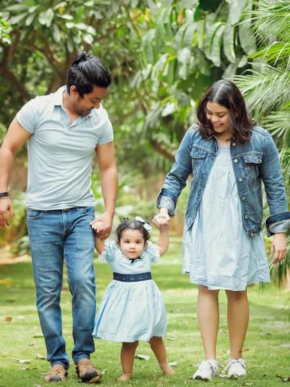 Family portraits are about connection. I focus on capturing those natural, unposed moments, like a simple walk in the park, that show the love and bond you share.