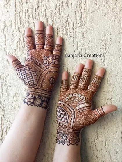 A beautiful and full design for Karwachauth, perfect for someone who loves detailed henna work.