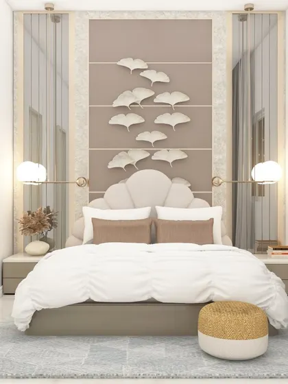 An elegant bedroom design with a scalloped headboard and delicate leaf-motif wall art. The neutral color palette and soft lighting create a peaceful and sophisticated atmosphere.
