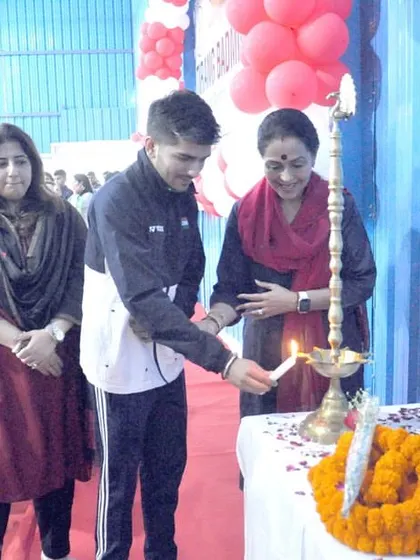 Asian Games Gold Medalist Tarun Dhillon lights the ceremonial lamp at our grand opening. His presence was a huge inspiration for all our students and guests.