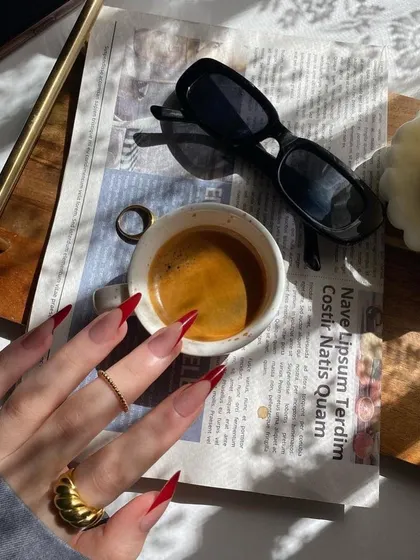 My morning coffee just hits different when my nails are on point. Loving these long, red stiletto nails.