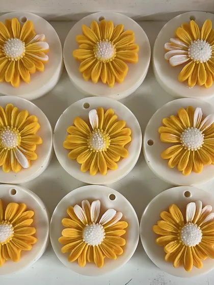 Our new daisy-topped wax sachets are almost too pretty to hide in a wardrobe.
