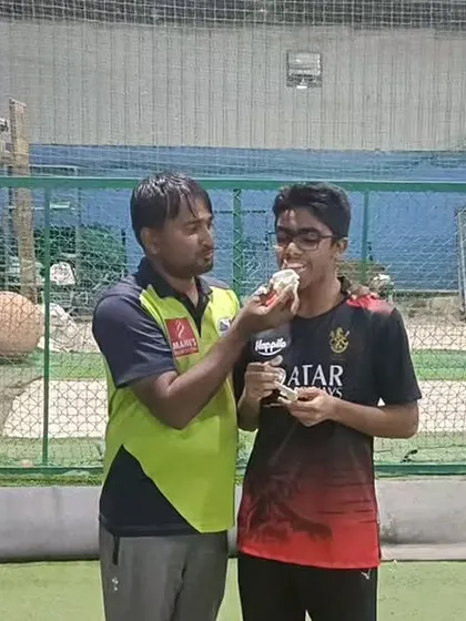 The traditional cake smash, a fun part of our academy's birthday celebrations. We believe in working hard and having fun together.