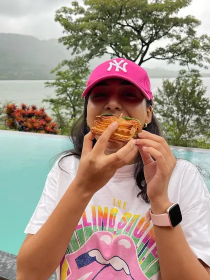 Enjoying a Baked Vada Pav Puff by the pool is the perfect way to spend a rainy day. It's my go-to comfort food.