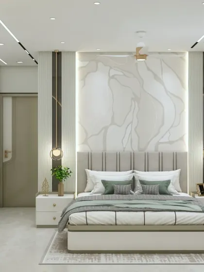 A full view of a luxurious master bedroom. The bed is framed by a stunning marble-finish panel and flanked by hanging pendant lights. The design is symmetrical, balanced, and exudes modern elegance.