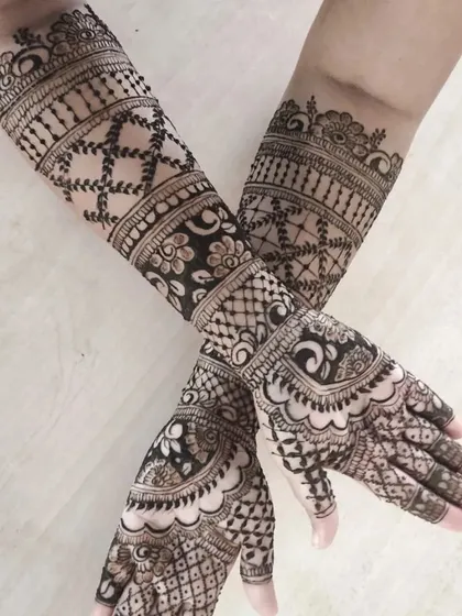 A classic back-of-hand design with a mix of checks, vines, and floral patterns, shown from different angles.