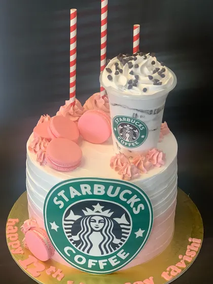For the coffee lover, I created this fun Starbucks-themed cake. It includes an edible coffee cup, pink macarons, and the iconic green logo, making it a unique treat for a 12th birthday.