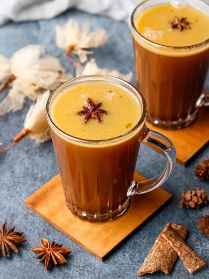 A cozy, atmospheric shot of a hot toddy, perfect for a cafe's seasonal menu. I used warm lighting and props like cinnamon sticks and star anise to evoke a feeling of comfort and warmth.