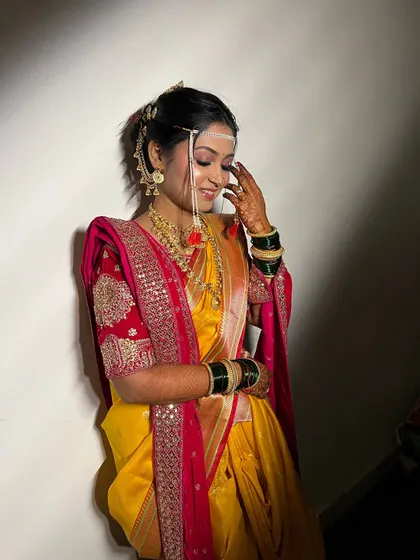 The complete look for my bride Sayali, showcasing the beautiful draping of her Paithani saree and the traditional jewellery.