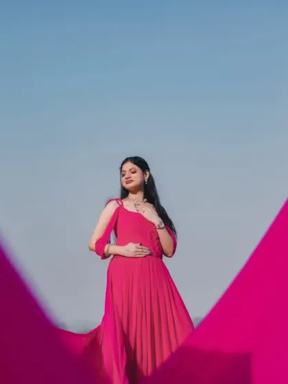 A creative shot using the gown's trail to frame the bride. This shows the versatility of our infinity trail gowns for artistic and unique pre-wedding photography.