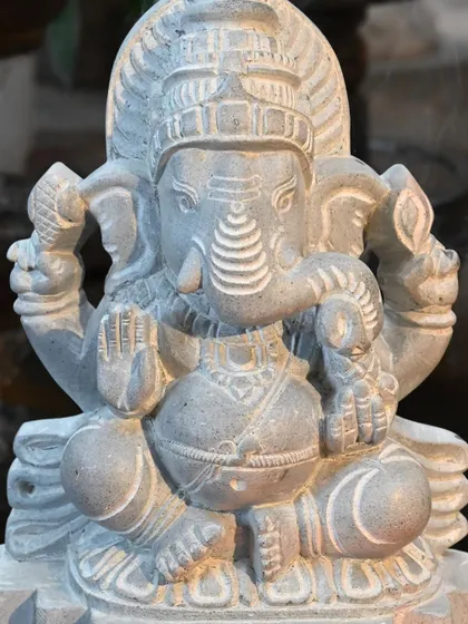 This Ganesha statue, called Buddhividhata, is revealed from natural stone by our master carvers. This is 'Kai kelasa' (work of hand), an art form passed down through generations, resulting in a truly one-of-a-kind piece.